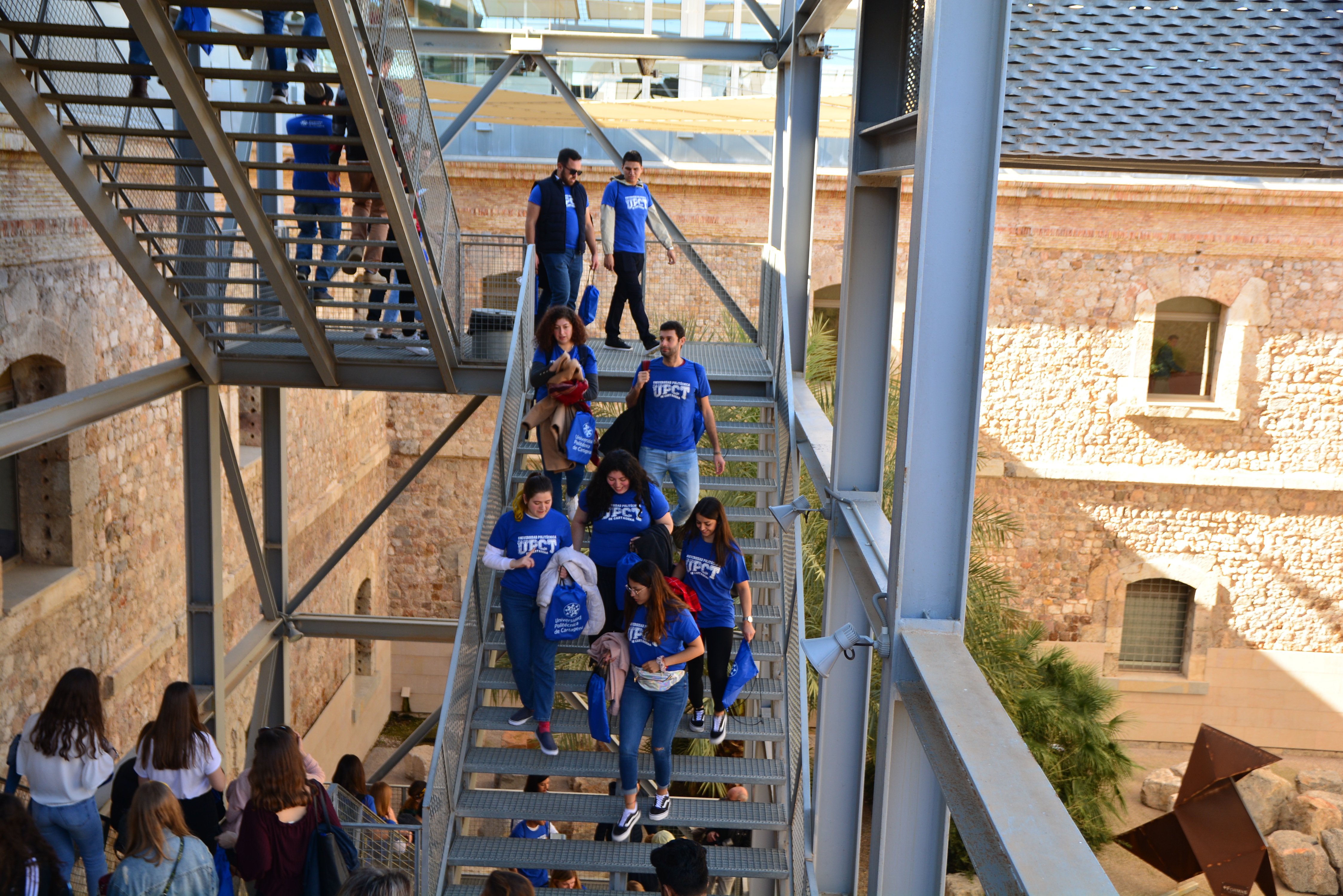 Students going down stairs